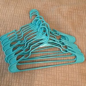 10 turquoise plastic hangers